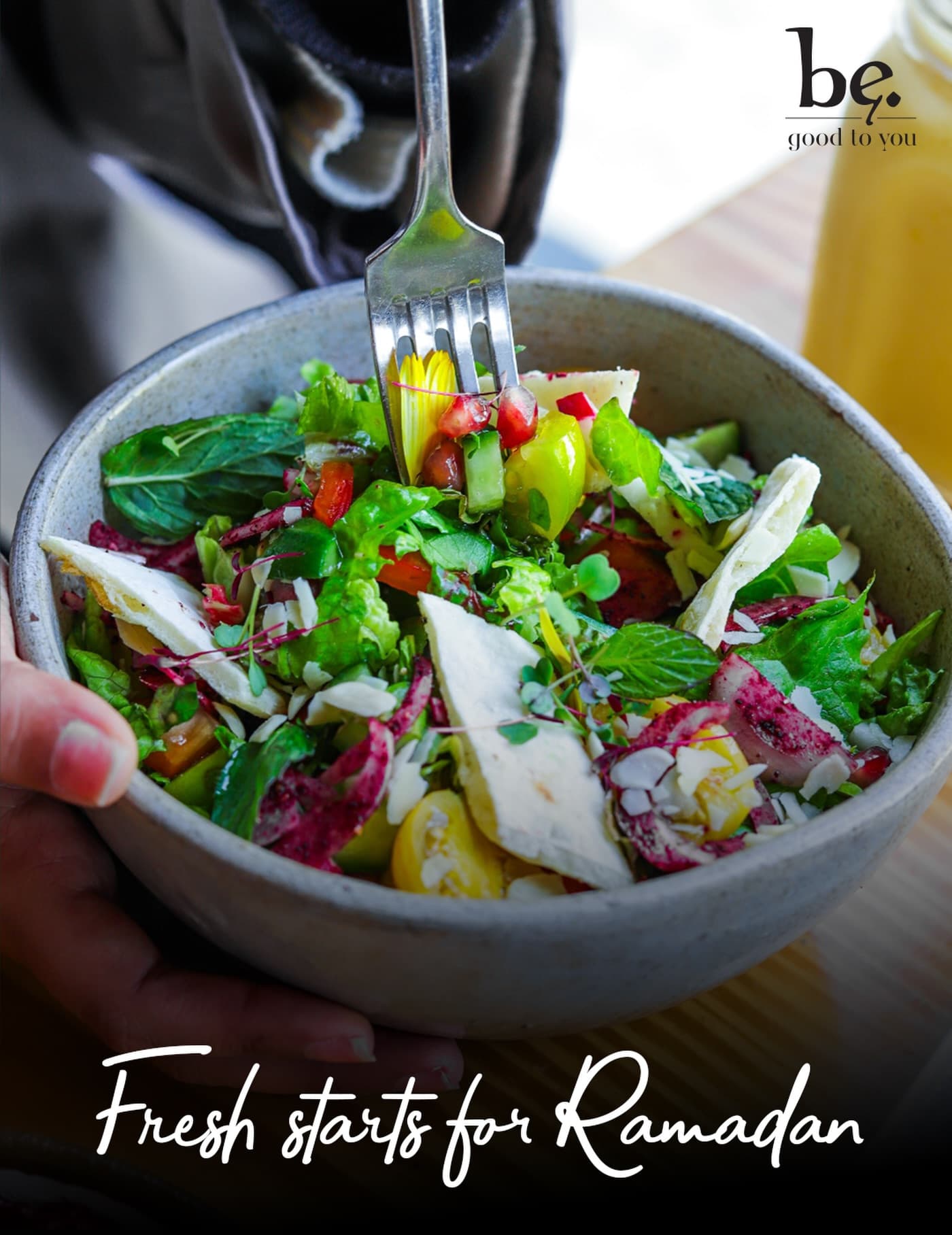 Fresh salad bowl with pomegranate seeds and seasonal greens